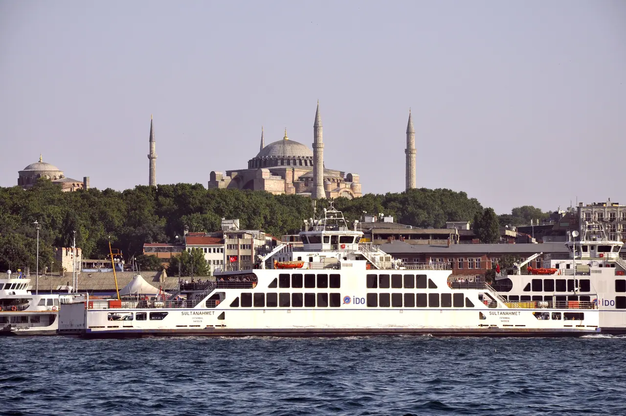 A ferry crossing the Bosphorus in İstanbul, with Hagia Sophia on the skyline